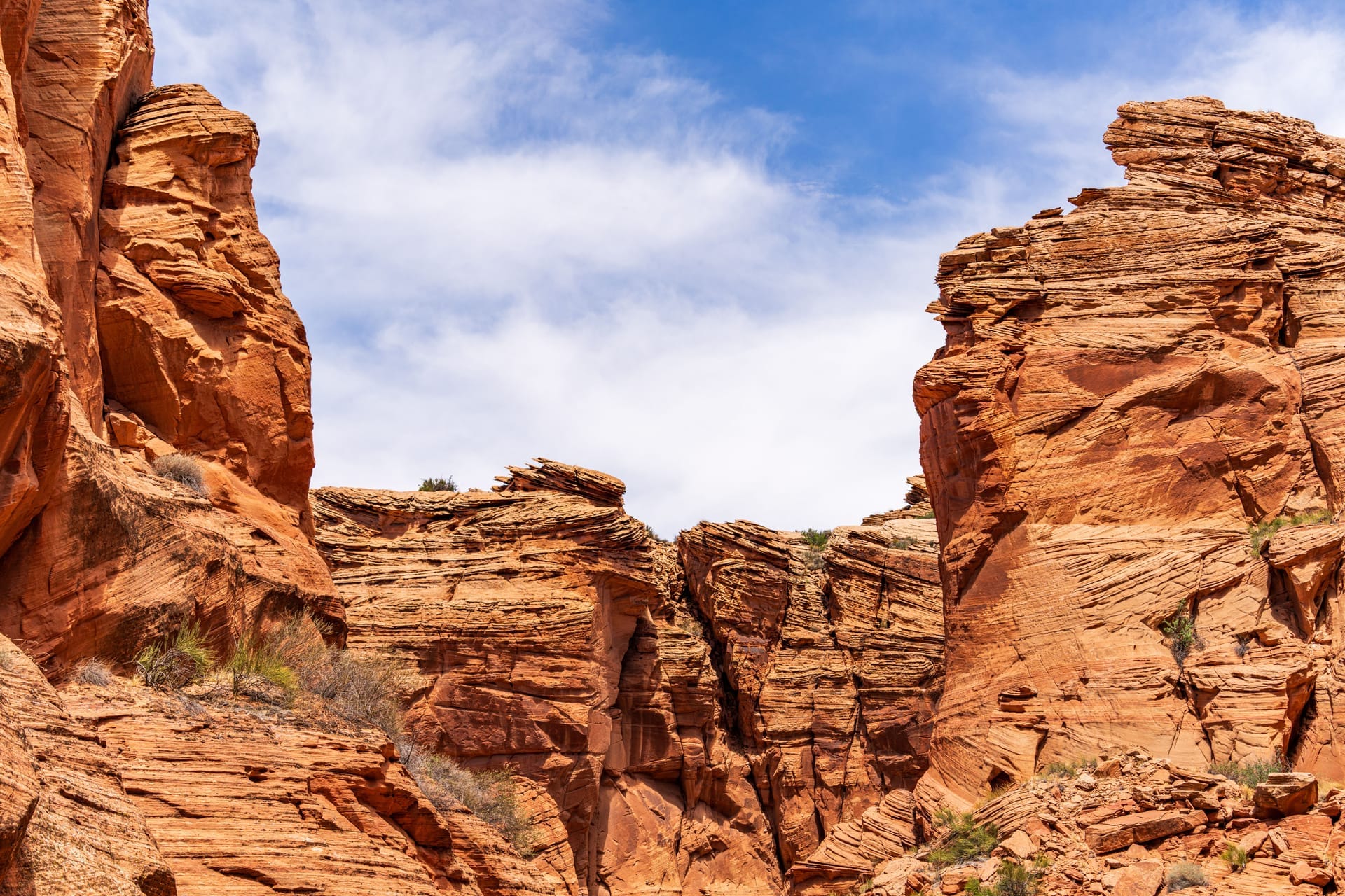 Explore the stunning rock formations of a desert canyon in Arizona, showcasing intricate erosion patterns and vibrant colors — Surprise, ZIP 85379